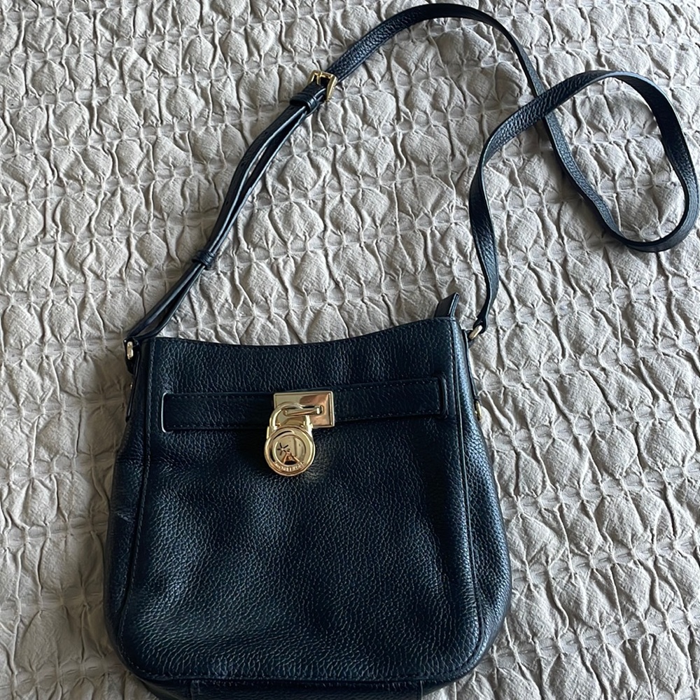 Michael Kors leather black cross body bag.